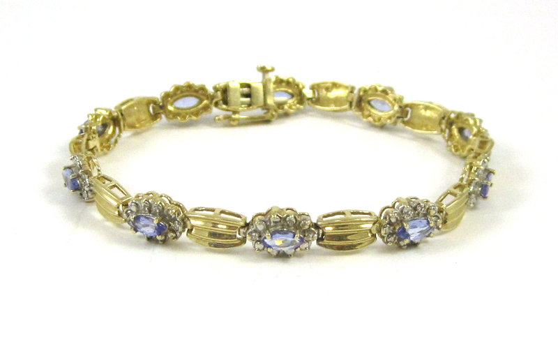 Appraisal: TANZANITE AND FOURTEEN KARAT GOLD BRACELET measuring - inches in