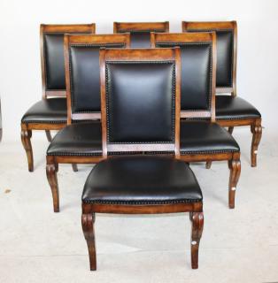 Appraisal: Set of mahogany leather chairs Set of mahogany leather chairs