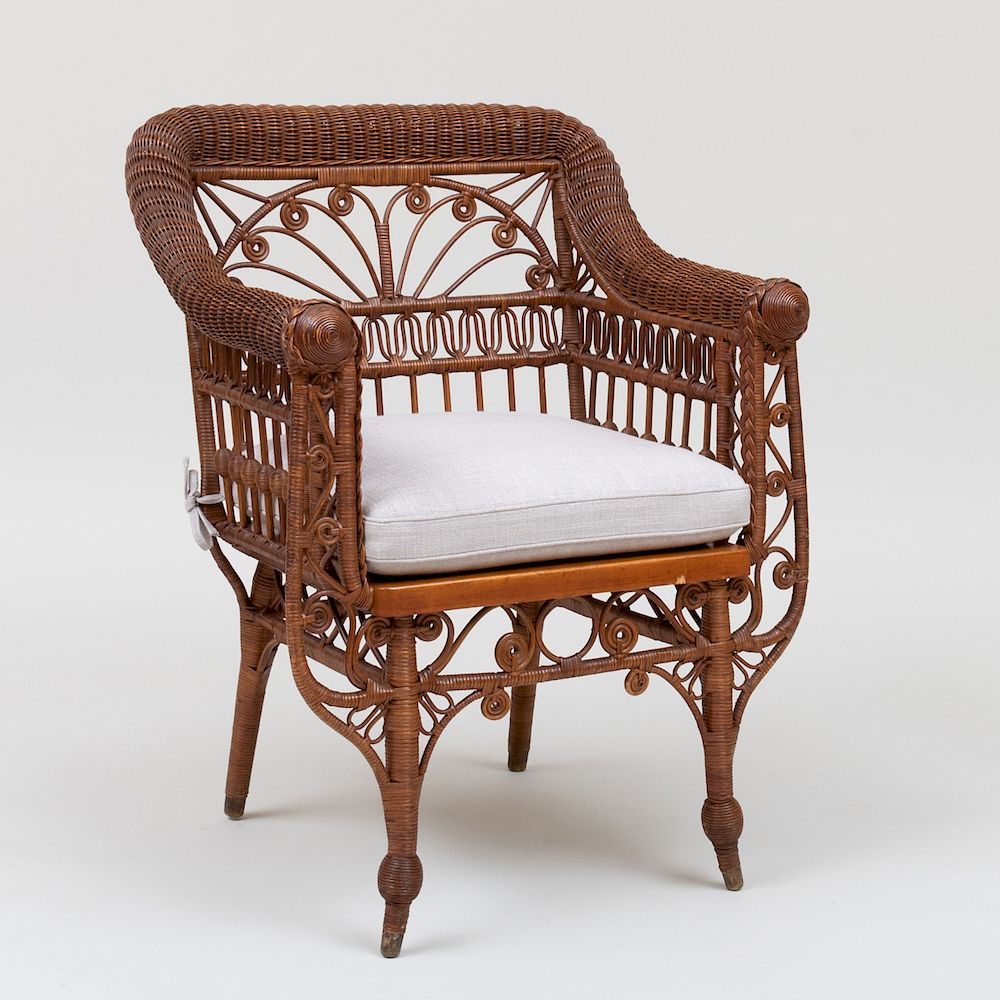 Appraisal: Victorian Wicker Armchair Heywood Bros Co Fitted with an upholstered