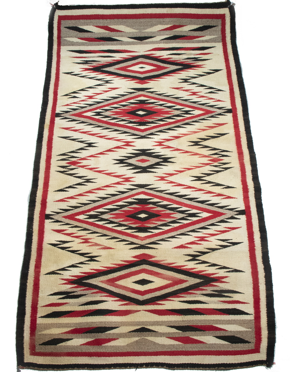 Appraisal: NAVAJO EYE DAZZLER RUG CIRCA In sand black red on