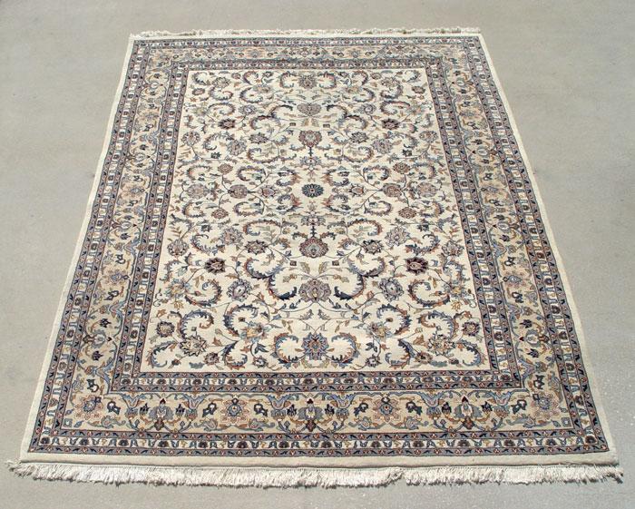 Appraisal: HAND TIED CREAM GROUND RUG Approx ' '' x '