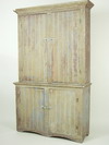 Appraisal: CUPBOARD - th C pine stepback two part wainscot cupboard