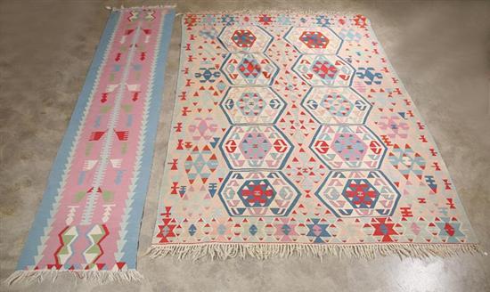 Appraisal: TWO ORIENTAL RUGS Kilims in pastel shades ' x '