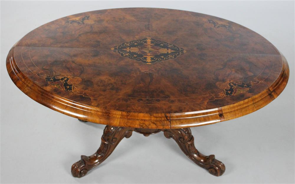 Appraisal: ITALIAN VICTORIAN INLAID FIGURED WALNUT TABLE the oval top with