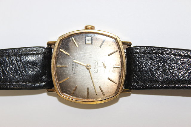 Appraisal: A ROTARY NINE CARAT GOLD GENT'S WRISTWATCH the bronze coloured