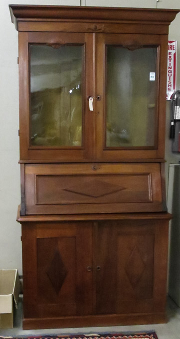 Appraisal: A VICTORIAN WALNUT SECRETARY BOOKCASE ON CABINET American last quarter