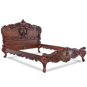 Appraisal: A Rococo Revival Carved Walnut Bed th Century Height of