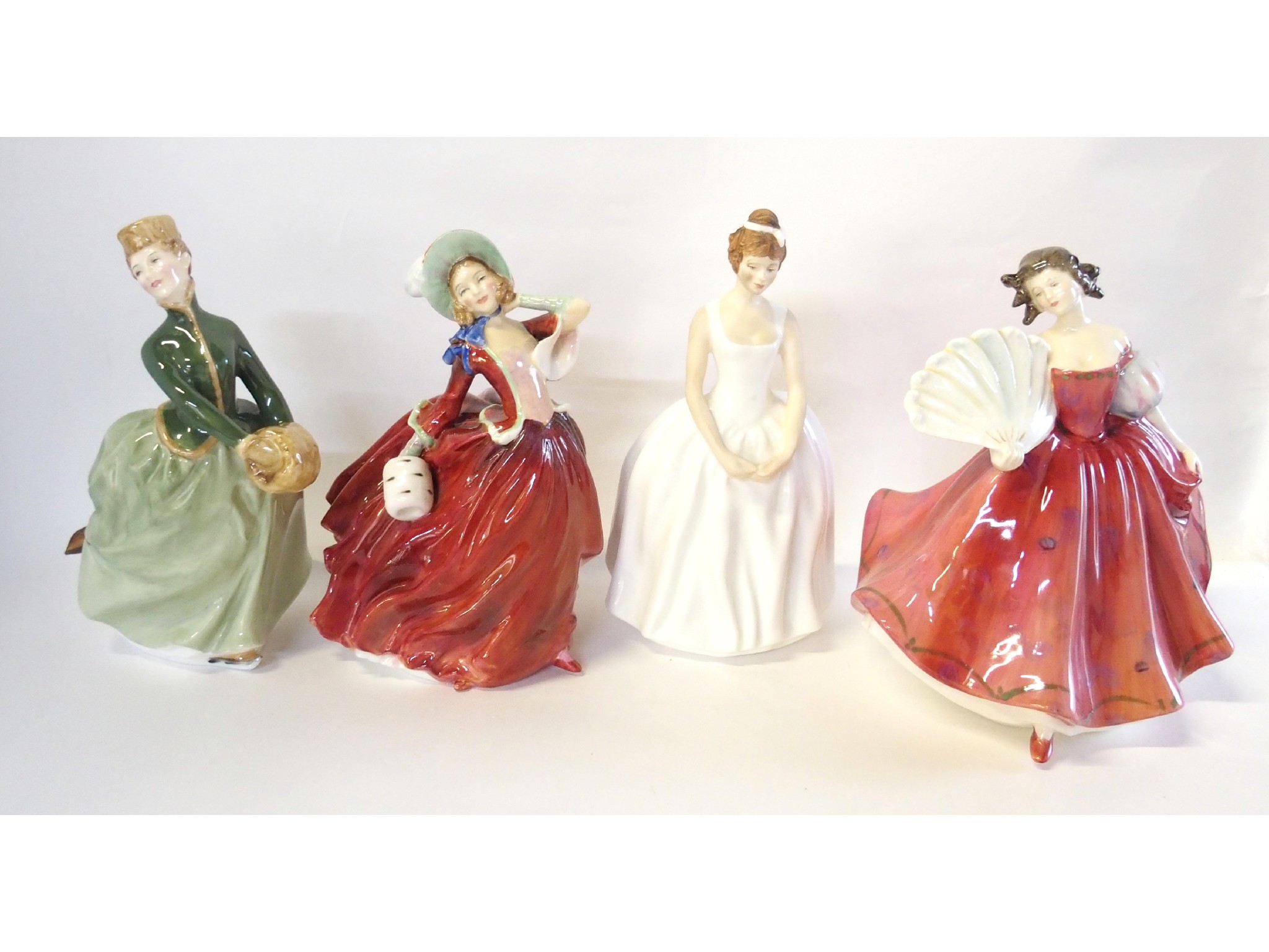 Appraisal: Four Royal Doulton figures to include 'Grace' HN 'Autumn Breezes'