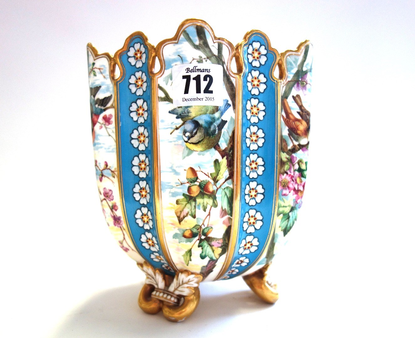 Appraisal: A Coalport porcelain cache pot circa the pierced and castellated