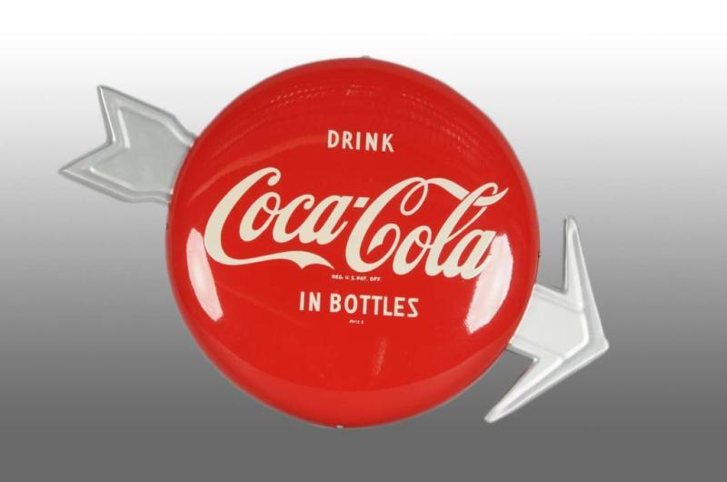 Appraisal: Tin Coca-Cola Button with Arrow Description Includes connecting hardware Bright