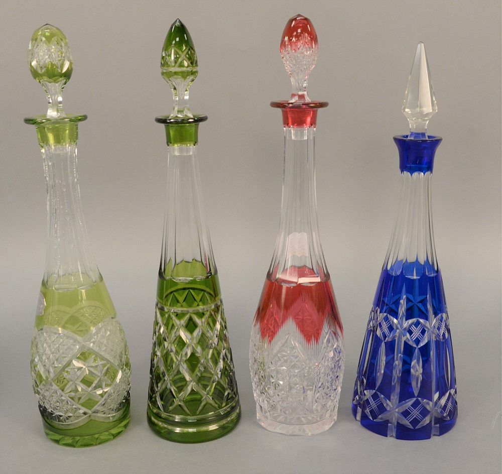 Appraisal: Group of four cut to clear glass decanters two green