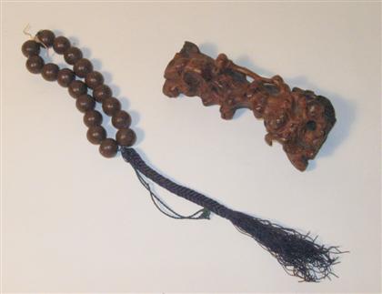 Appraisal: Chinese rootwood joss stick holder and set of wood beads