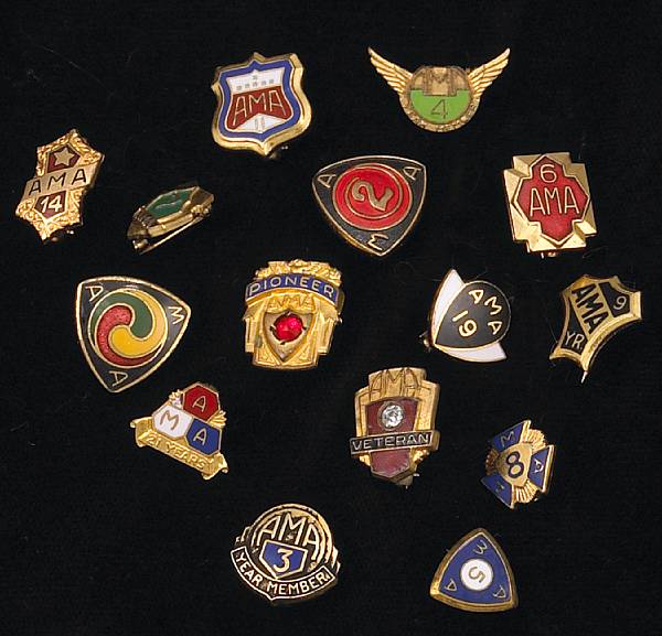 Appraisal: A collection of fifteen American Motorcycle Association lapel pins including