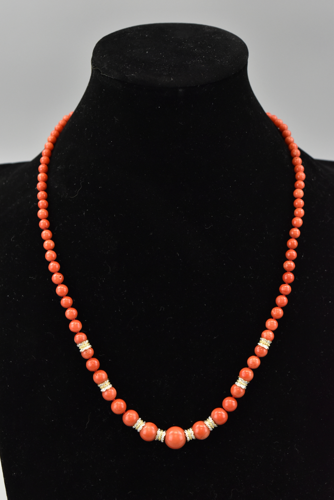 Appraisal: A coral bead necklace Beads get progressively larger from back