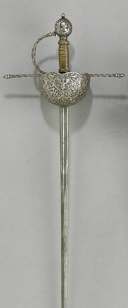 Appraisal: An elaborate cup-hilt rapier in th century style Narrow inch