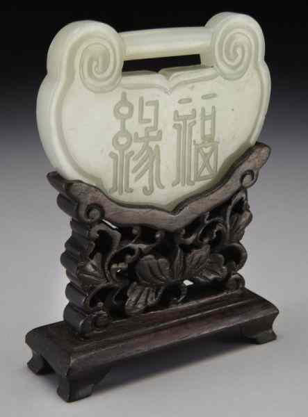 Appraisal: Chinese Qing carved jade pendant in lingzhi shape ''H x