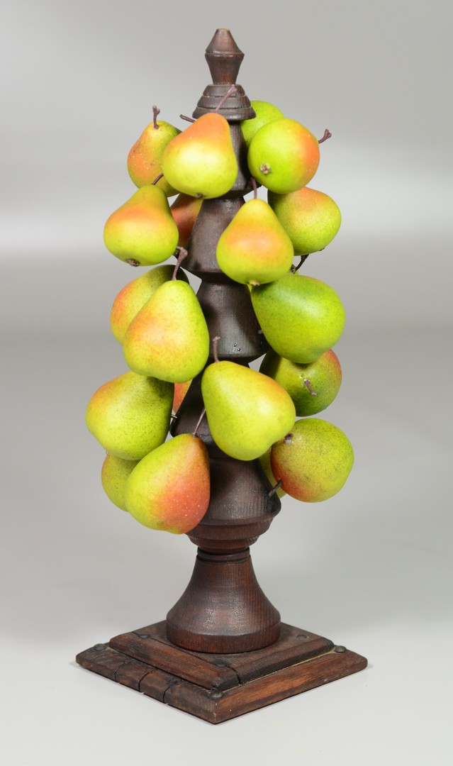 Appraisal: Carved and painted wood pear tree chestnut base with some