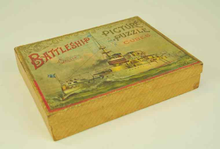 Appraisal: MCLOUGHLIN BATTLESHIP PUZZLE CUBES Lithographed paper and cardboard puzzle cubes