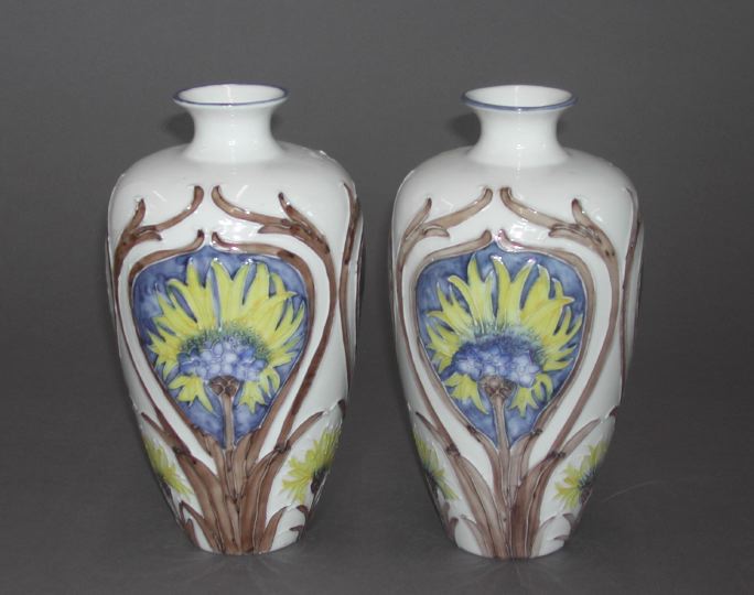 Appraisal: Good Pair of Rozenberg Holland Slip-Decorated Florian Ware Porcelain Pyriform