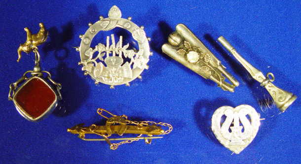 Appraisal: Assorted silver jewellery including cricket brooch hardstone spinner watch key