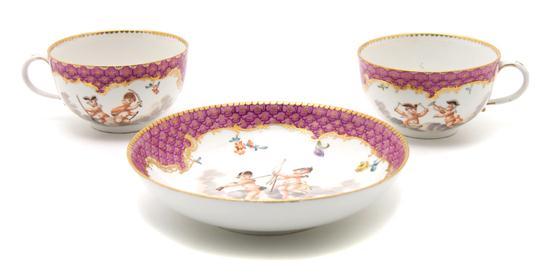 Appraisal: Two Meissen Porcelain Teacups and a Saucer decorated with scenes