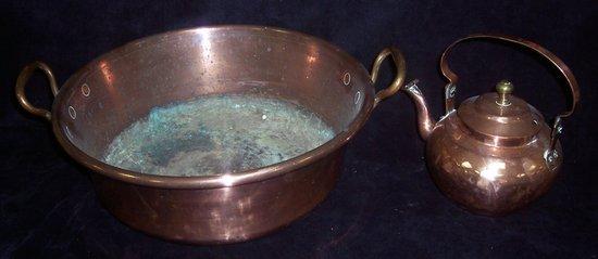 Appraisal: A copper two-handled preserving pan cm wide and a Dutch