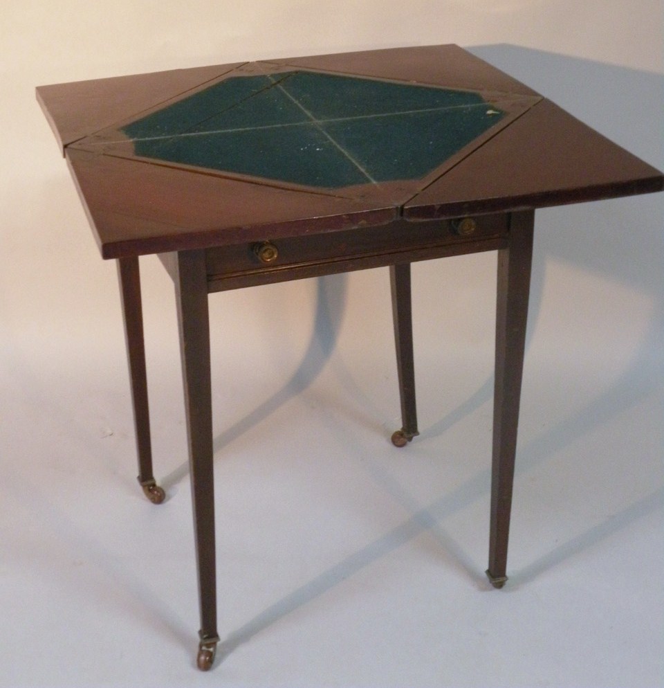 Appraisal: An Edwardian mahogany envelope card table the square top opening