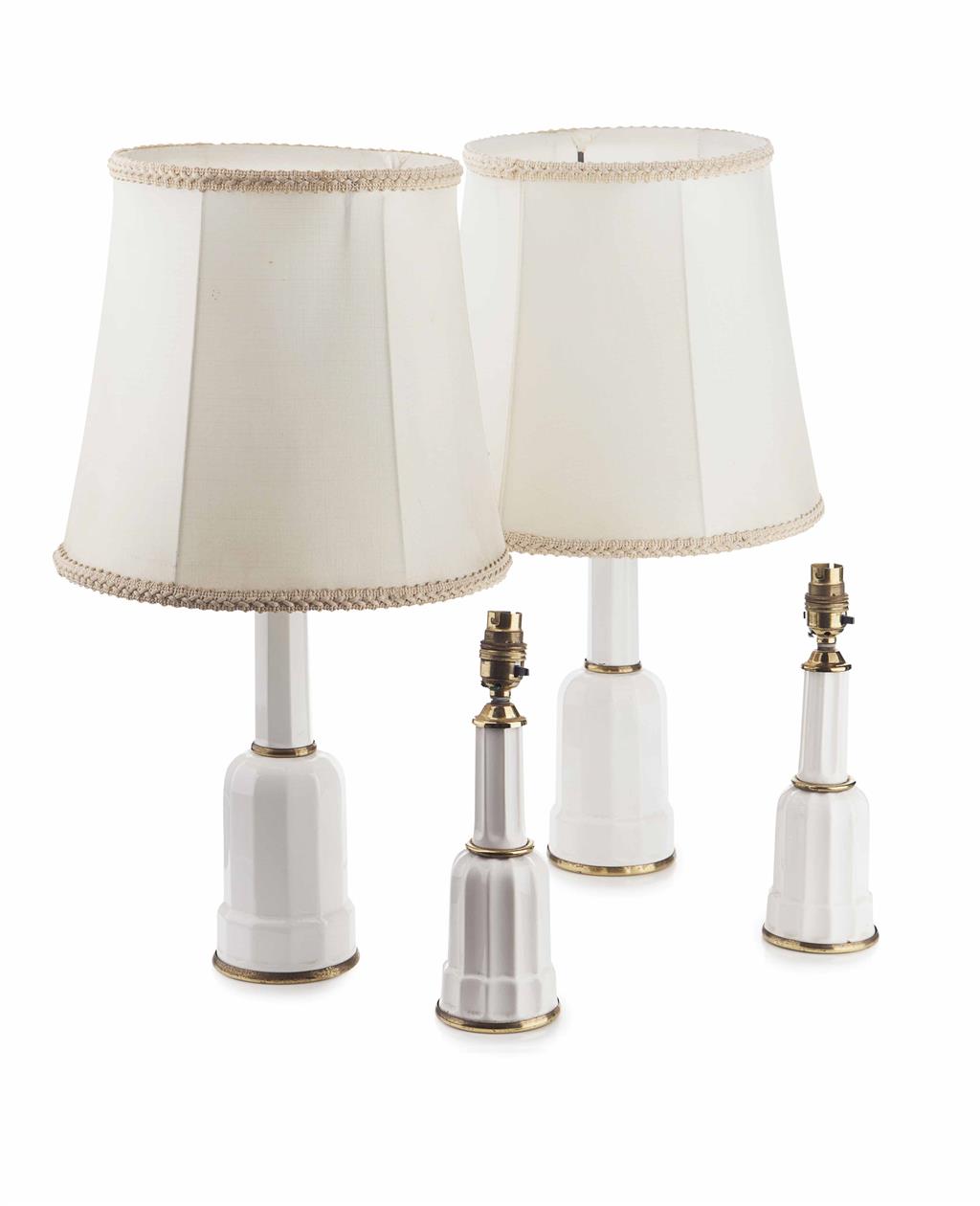 Appraisal: TWO PAIRS OF POTTERY TABLE LAMPS MODERN of facetted mallet