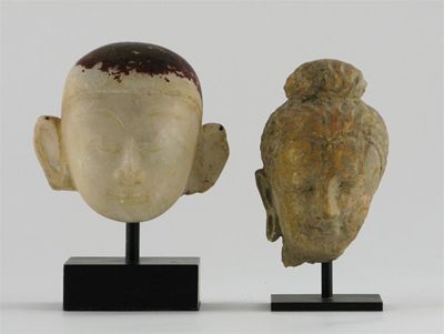 Appraisal: A Burmese alabaster head of Buddha his eyes closed in