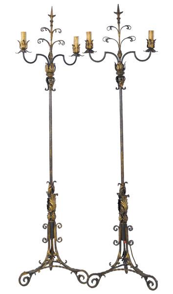 Appraisal: WROUGHT-IRON TORCHERES A pair with gilded highlights electrified early th