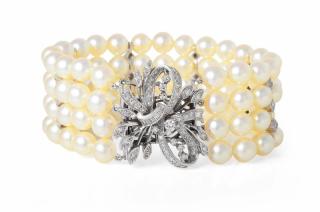 Appraisal: A Four Strand Pearls and Diamond Bracelet Featuring four rows