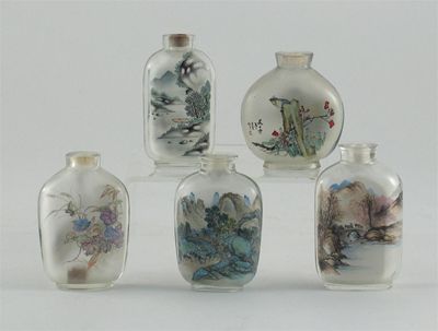 Appraisal: Five glass snuff bottles painted on the interior four with