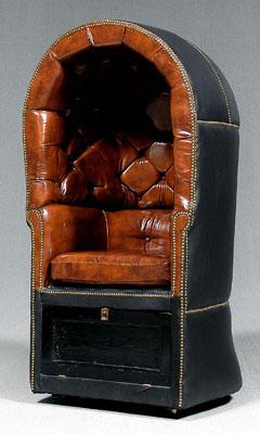 Appraisal: Tufted leather concierge chair black and brown leather with brass