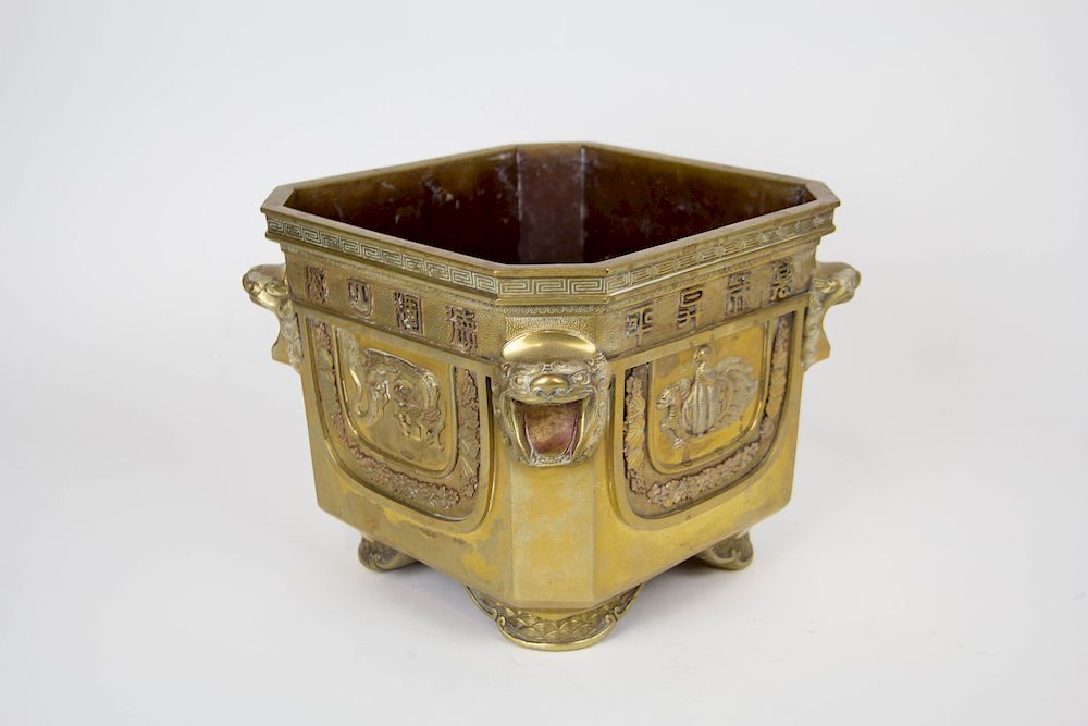 Appraisal: Bronze Chinese Four Directions Jardiniere Each side decorated with an