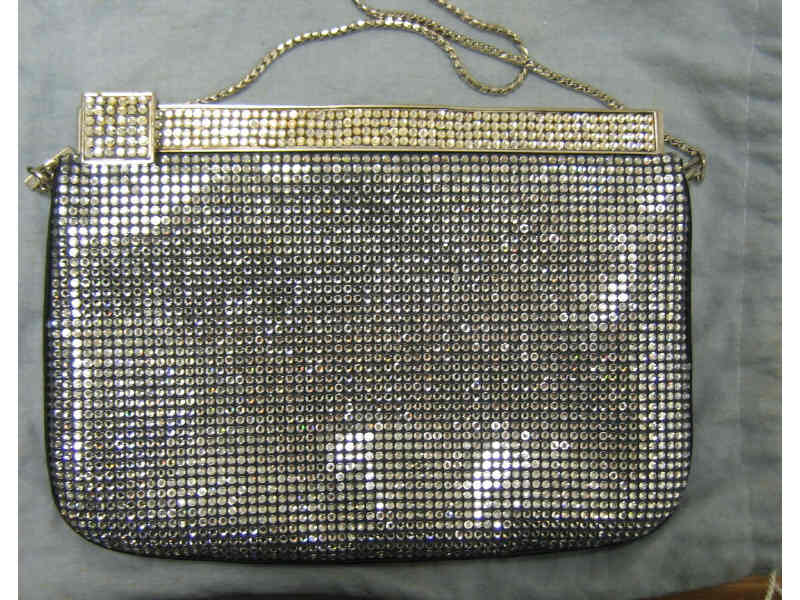 Appraisal: JUDITH LIEBER RHINESTONE HANDBAG Rectangular soft clutch with chain handle