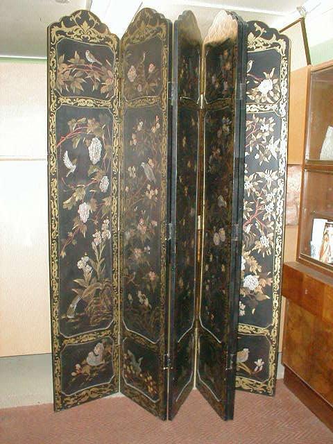 Appraisal: A Japanese black lacquer four fold coromandel dressing screen with