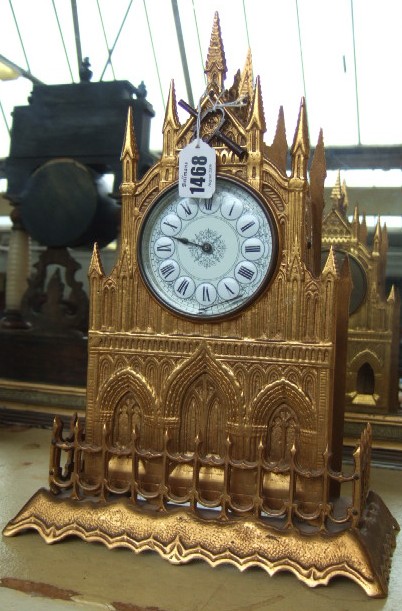 Appraisal: A th century gilt metal mantel clock the case formed