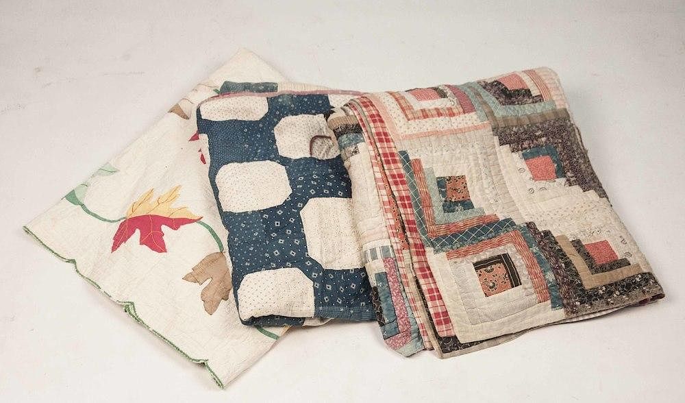 Appraisal: Three Quilts Lot of three quilts comprising a log cabin