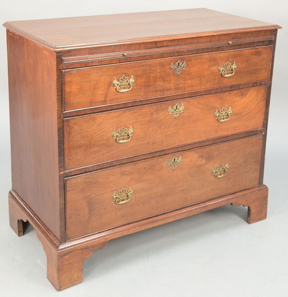 Appraisal: George III mahogany chest with pull out slide over three