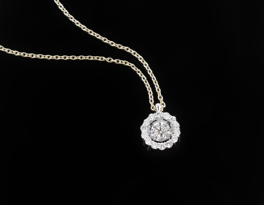 Appraisal: K DANCING DIAMOND PENDANT Pendant has CT white diamond in