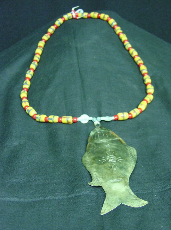 Appraisal: HUDSON BAY FISH ON TRADE BEAD NECKLACE Large land engraved