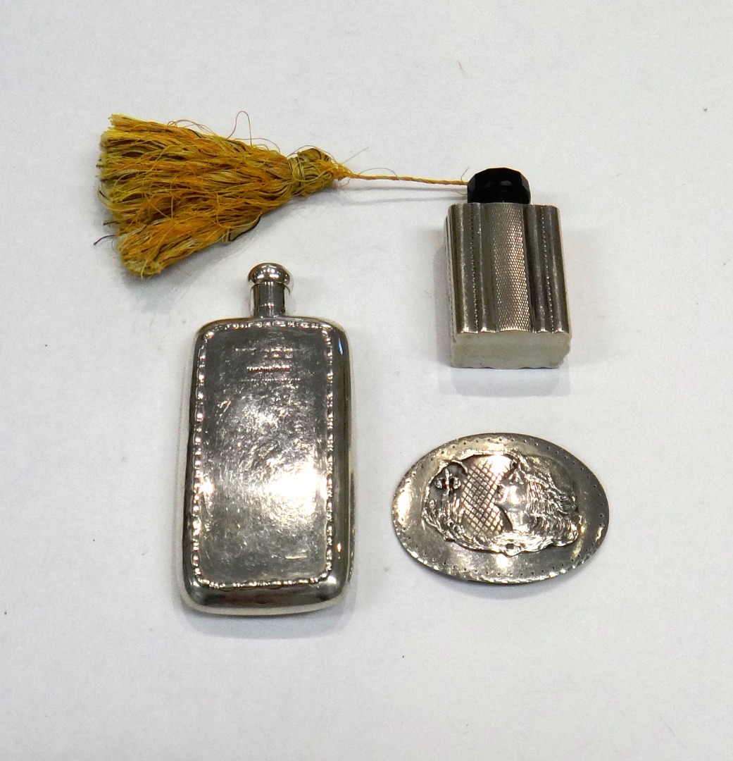 Appraisal: A silver scent bottle of curved rectangular flask form having