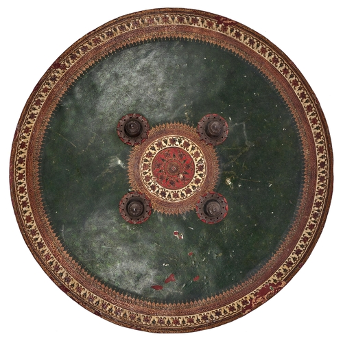 Appraisal: An Indian lacquered hide shield dhal th c of slightly