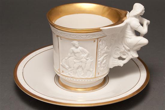 Appraisal: RPM classical relief porcelain cup and saucer early th century