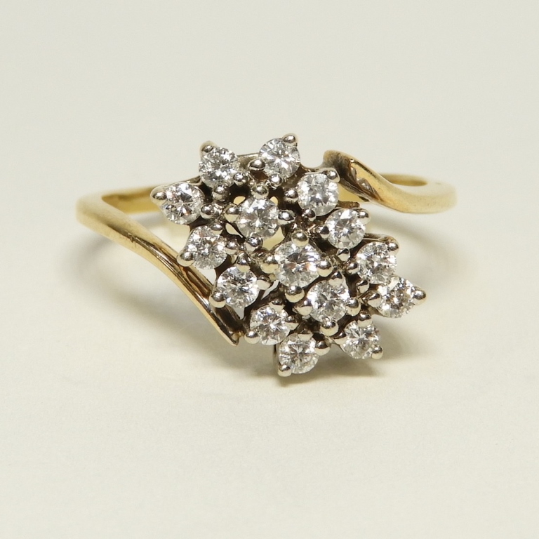 Appraisal: K YELLOW GOLD DIAMOND LADY'S COCKTAIL RING th CenturyFifteen openwork