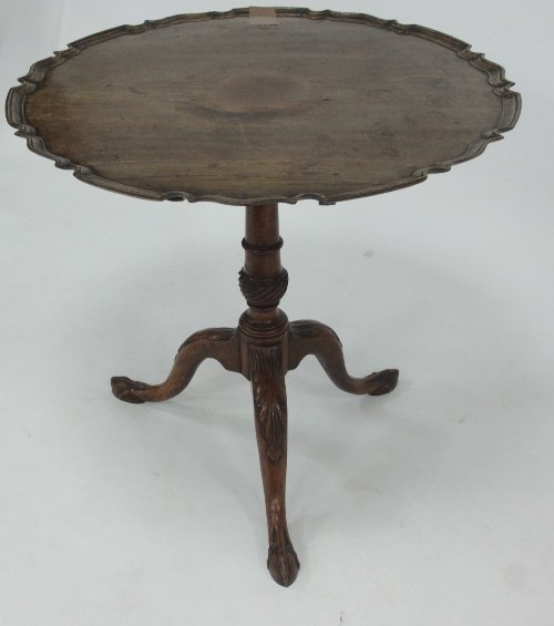 Appraisal: A mahogany tripod table of th Century design the top