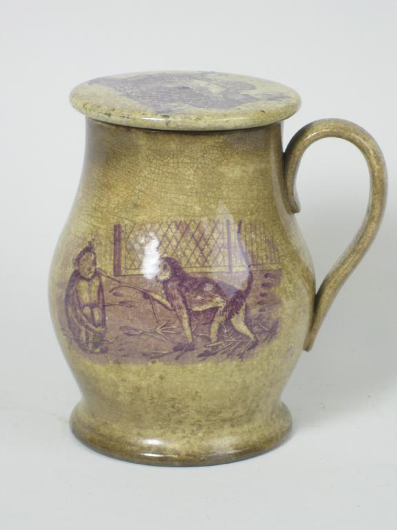 Appraisal: A mid th Century pottery Tankard with crew-top lid and