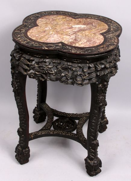 Appraisal: th Century heavily carved Chinese taboret stand with marble top