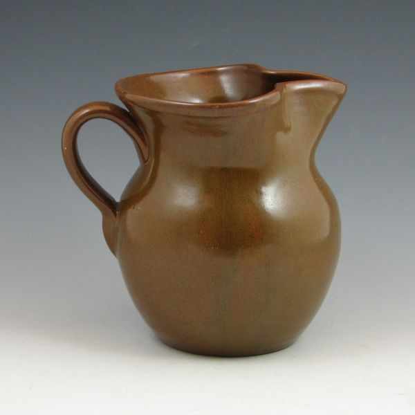 Appraisal: Southern pottery pitcher in brown semi-gloss Signed Teagues Robbins T-