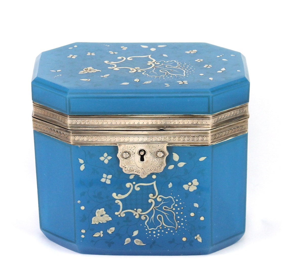 Appraisal: An opaque blue glass casket with plated mounts of rectangular